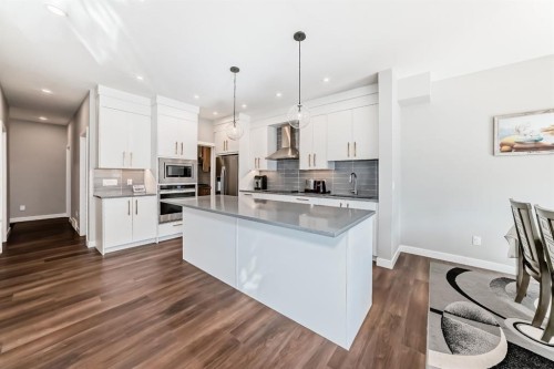 321 Carringvue Place Nw, Calgary, AB - Indoor Photo Showing Kitchen With Stainless Steel Kitchen With Upgraded Kitchen
