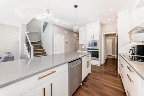 321 Carringvue Place Nw, Calgary, AB - Indoor Photo Showing Kitchen With Upgraded Kitchen