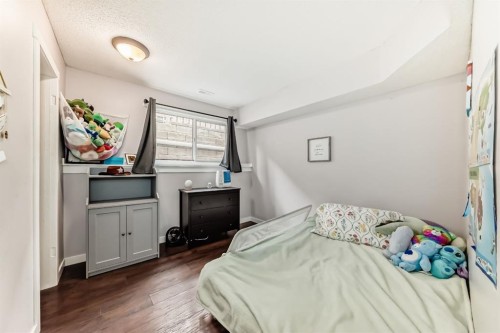 724D Raynard Crescent Se, Calgary, AB - Indoor Photo Showing Bedroom