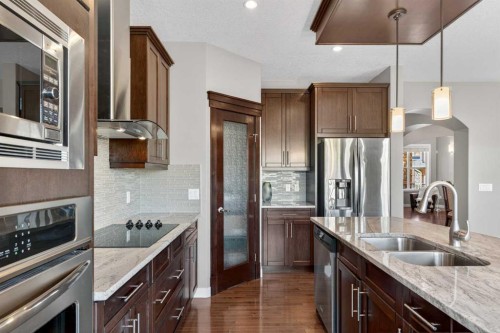 145 Sage Meadows Circle Nw, Calgary, AB - Indoor Photo Showing Kitchen With Stainless Steel Kitchen With Double Sink With Upgraded Kitchen