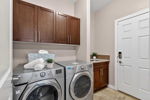 145 Sage Meadows Circle Nw, Calgary, AB - Indoor Photo Showing Laundry Room