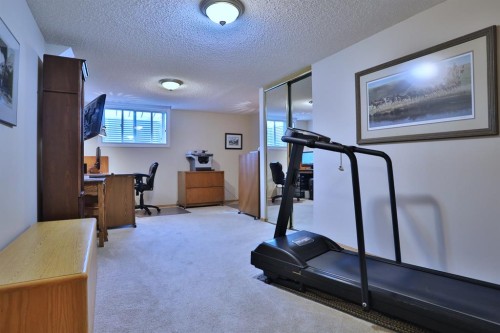 185 Hamptons Square Nw, Calgary, AB - Indoor Photo Showing Gym Room