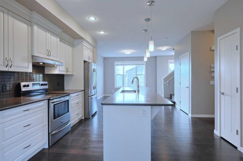185 Panatella Square Nw, Calgary, AB - Indoor Photo Showing Kitchen With Upgraded Kitchen