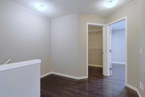 185 Panatella Square Nw, Calgary, AB - Indoor Photo Showing Other Room