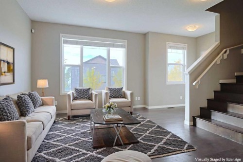 185 Panatella Square Nw, Calgary, AB - Indoor Photo Showing Living Room