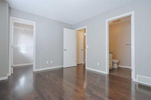 185 Panatella Square Nw, Calgary, AB - Indoor Photo Showing Other Room