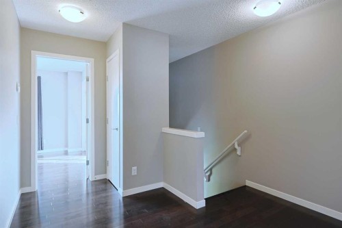 185 Panatella Square Nw, Calgary, AB - Indoor Photo Showing Other Room