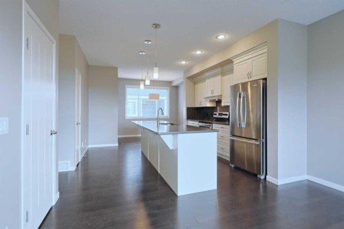 185 Panatella Square Nw, Calgary, AB - Indoor Photo Showing Kitchen With Stainless Steel Kitchen
