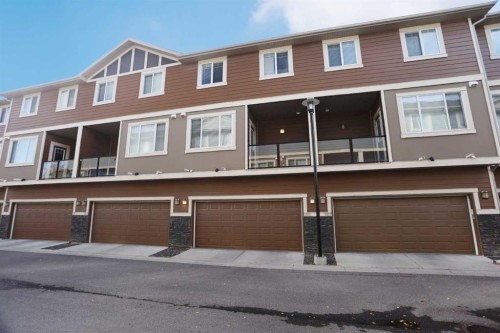 185 Panatella Square Nw, Calgary, AB - Outdoor With Balcony With Facade