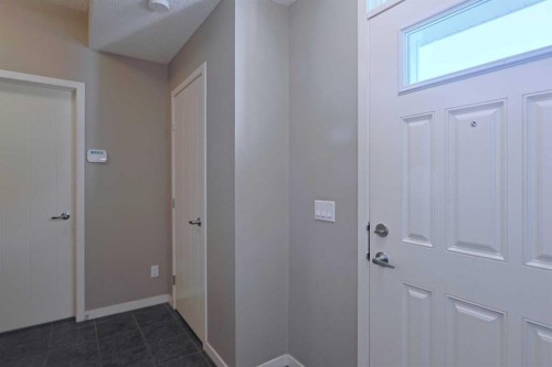 185 Panatella Square Nw, Calgary, AB - Indoor Photo Showing Other Room