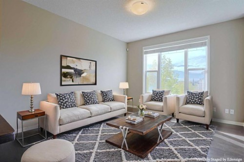 185 Panatella Square Nw, Calgary, AB - Indoor Photo Showing Living Room