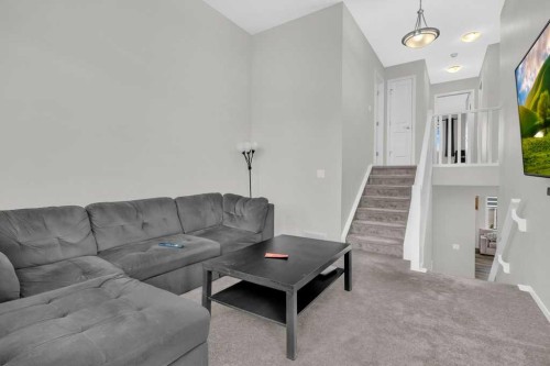 749 Windrow Manor Sw, Airdrie, AB - Indoor Photo Showing Living Room