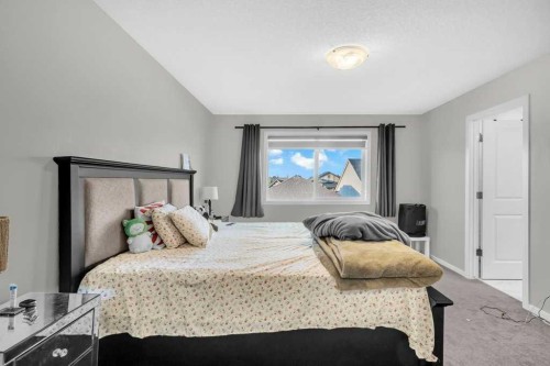 749 Windrow Manor Sw, Airdrie, AB - Indoor Photo Showing Bedroom