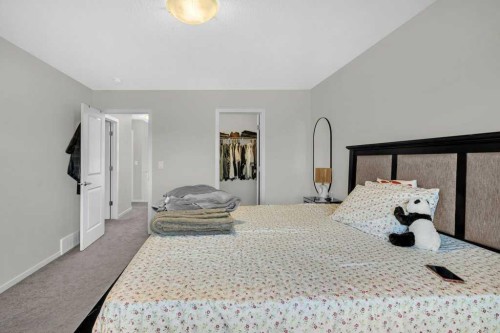 749 Windrow Manor Sw, Airdrie, AB - Indoor Photo Showing Bedroom