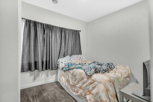 749 Windrow Manor Sw, Airdrie, AB - Indoor Photo Showing Bedroom
