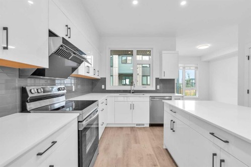 404-85 Sage Hill Heights Nw, Calgary, AB - Indoor Photo Showing Kitchen With Upgraded Kitchen