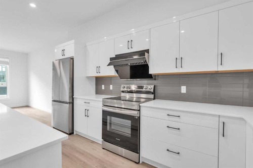 404-85 Sage Hill Heights Nw, Calgary, AB - Indoor Photo Showing Kitchen With Stainless Steel Kitchen