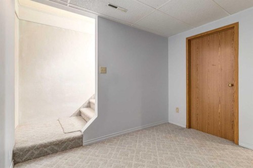 244 Maple Court Crescent Se, Calgary, AB - Indoor Photo Showing Other Room