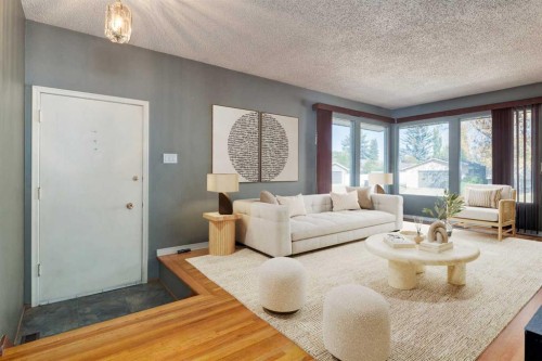 244 Maple Court Crescent Se, Calgary, AB - Indoor Photo Showing Living Room