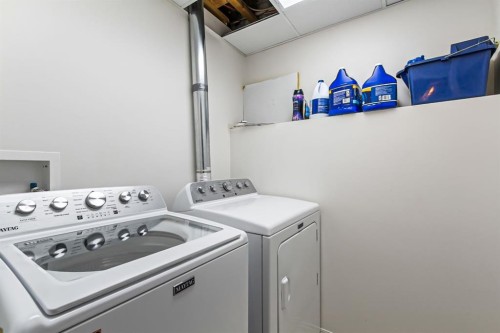 2018 24 Avenue, Didsbury, AB - Indoor Photo Showing Laundry Room