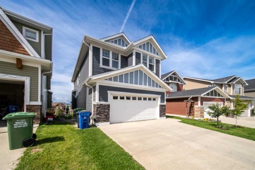 27 Sunset Park, Cochrane, AB - Outdoor With Facade