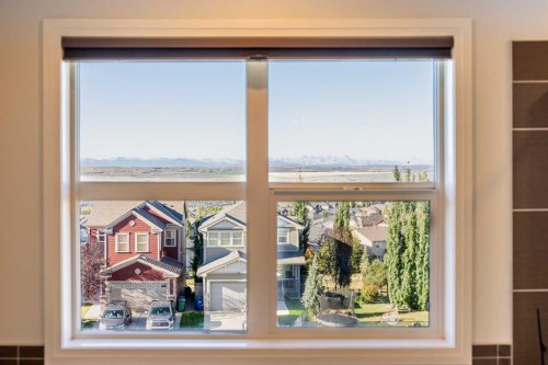 27 Sunset Park, Cochrane, AB - Indoor Photo Showing Other Room