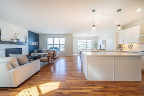 27 Sunset Park, Cochrane, AB - Indoor With Fireplace