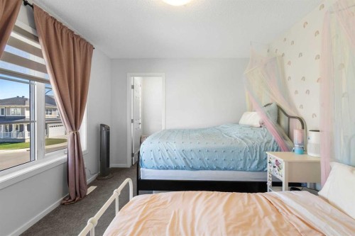 124 Carringham Way Nw, Calgary, AB - Indoor Photo Showing Bedroom