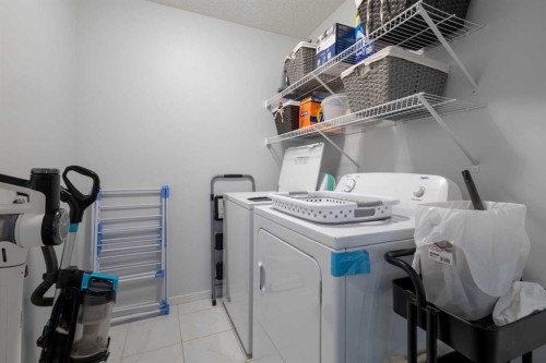 124 Carringham Way Nw, Calgary, AB - Indoor Photo Showing Laundry Room