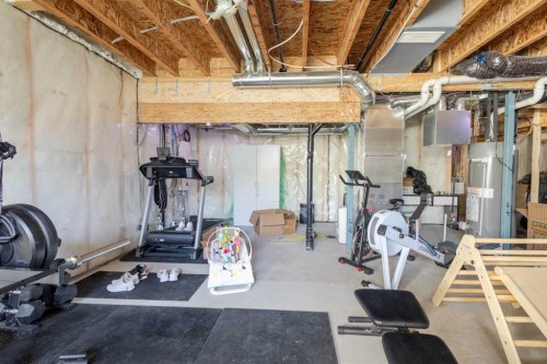 124 Carringham Way Nw, Calgary, AB - Indoor Photo Showing Gym Room