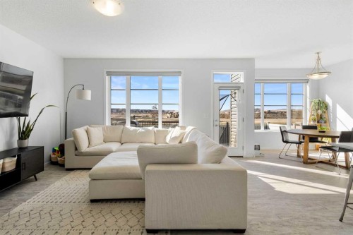 124 Carringham Way Nw, Calgary, AB - Indoor Photo Showing Living Room