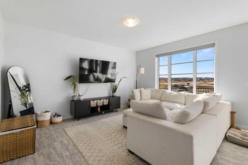 124 Carringham Way Nw, Calgary, AB - Indoor Photo Showing Living Room