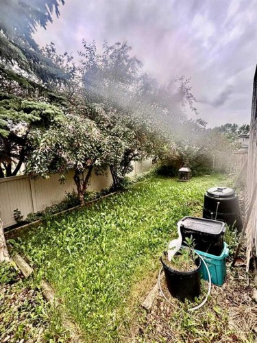 22 Riverside Close Se, Calgary, AB - Outdoor