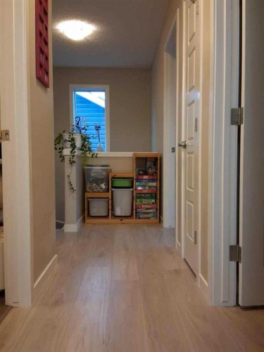 49 Fireside Bend, Cochrane, AB - Indoor Photo Showing Other Room