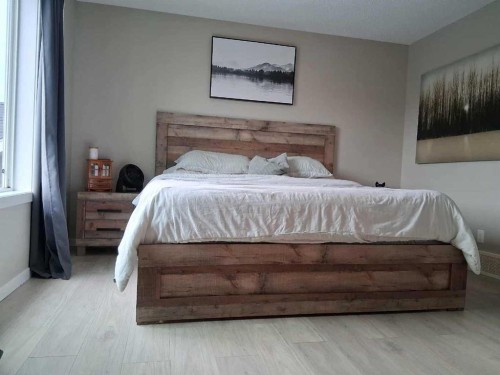 49 Fireside Bend, Cochrane, AB - Indoor Photo Showing Bedroom