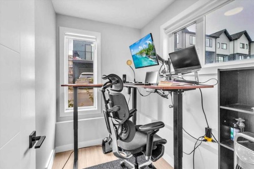 203 Evanscrest Square Nw, Calgary, AB - Indoor Photo Showing Gym Room