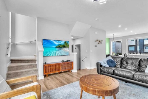 203 Evanscrest Square Nw, Calgary, AB - Indoor Photo Showing Living Room