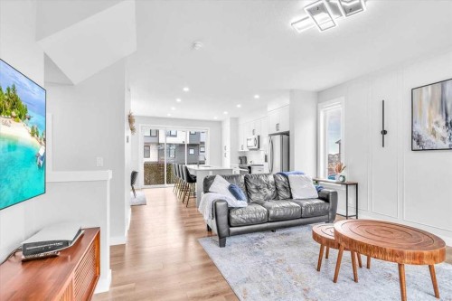 203 Evanscrest Square Nw, Calgary, AB - Indoor Photo Showing Living Room