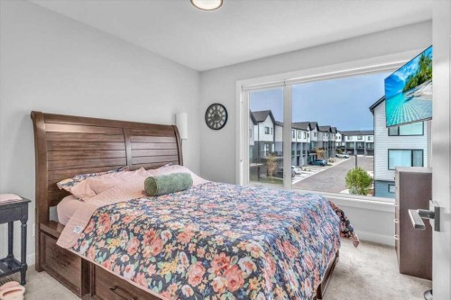 203 Evanscrest Square Nw, Calgary, AB - Indoor Photo Showing Bedroom
