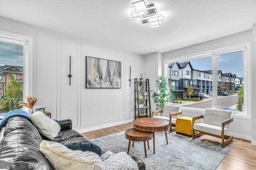 203 Evanscrest Square Nw, Calgary, AB - Indoor Photo Showing Living Room