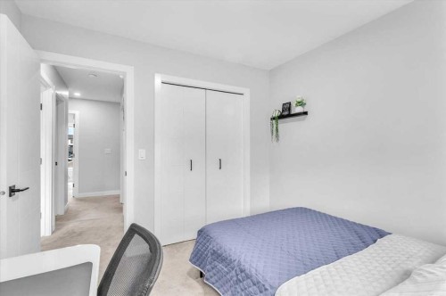 203 Evanscrest Square Nw, Calgary, AB - Indoor Photo Showing Bedroom