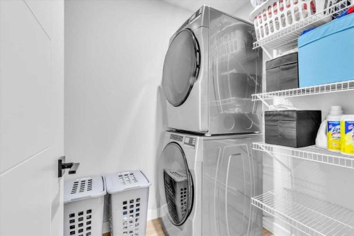 203 Evanscrest Square Nw, Calgary, AB - Indoor Photo Showing Laundry Room