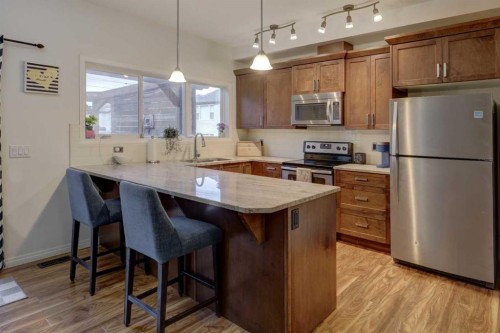 468 Hillcrest Circle Sw, Airdrie, AB - Indoor Photo Showing Kitchen With Stainless Steel Kitchen