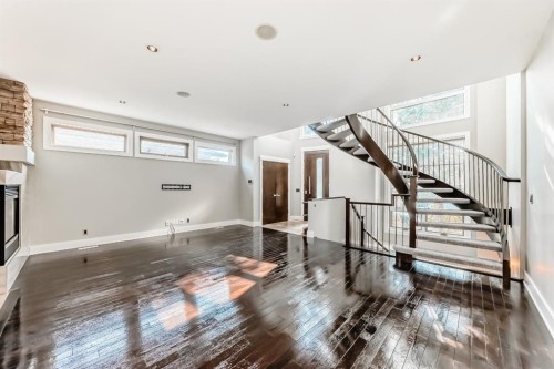 2428 31 Avenue Sw, Calgary, AB - Indoor Photo Showing Other Room With Fireplace
