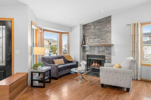 177 Hidden Vale Close Nw, Calgary, AB - Indoor Photo Showing Living Room With Fireplace