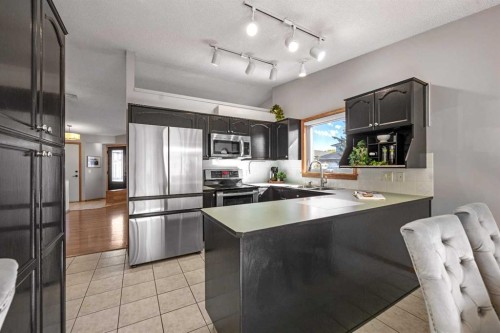 177 Hidden Vale Close Nw, Calgary, AB - Indoor Photo Showing Kitchen With Stainless Steel Kitchen