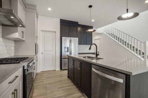 188 Sage Hill Heights Nw, Calgary, AB - Indoor Photo Showing Kitchen With Stainless Steel Kitchen With Double Sink With Upgraded Kitchen