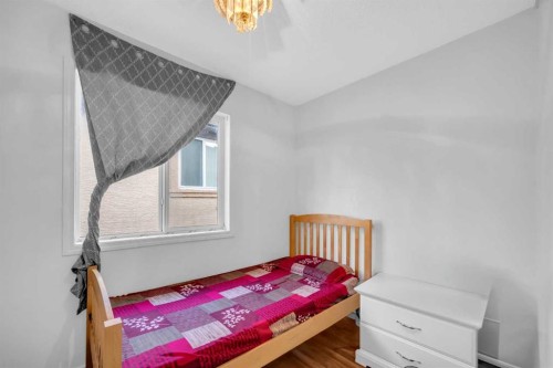 308 Taracove Estate Drive Ne, Calgary, AB - Indoor Photo Showing Bedroom