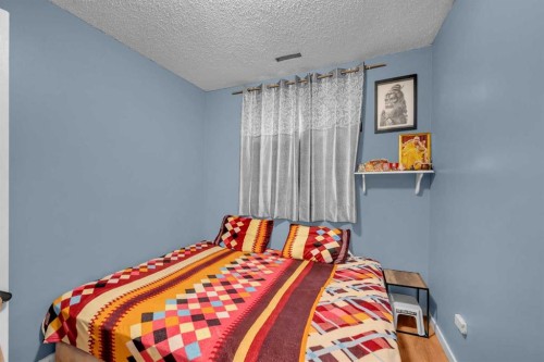 308 Taracove Estate Drive Ne, Calgary, AB - Indoor Photo Showing Bedroom