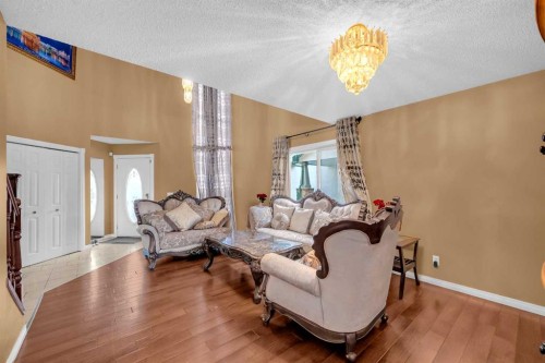 308 Taracove Estate Drive Ne, Calgary, AB - Indoor Photo Showing Living Room